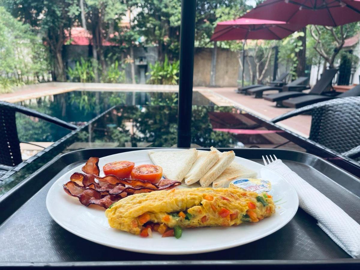 Angkor Tiger Resort Siem Reap Bagian luar foto